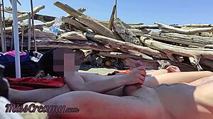 Exhibitionist beach voyeur captures intense orgasm with camera