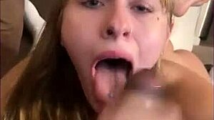 A blonde gets her throat filled by a massive black dick